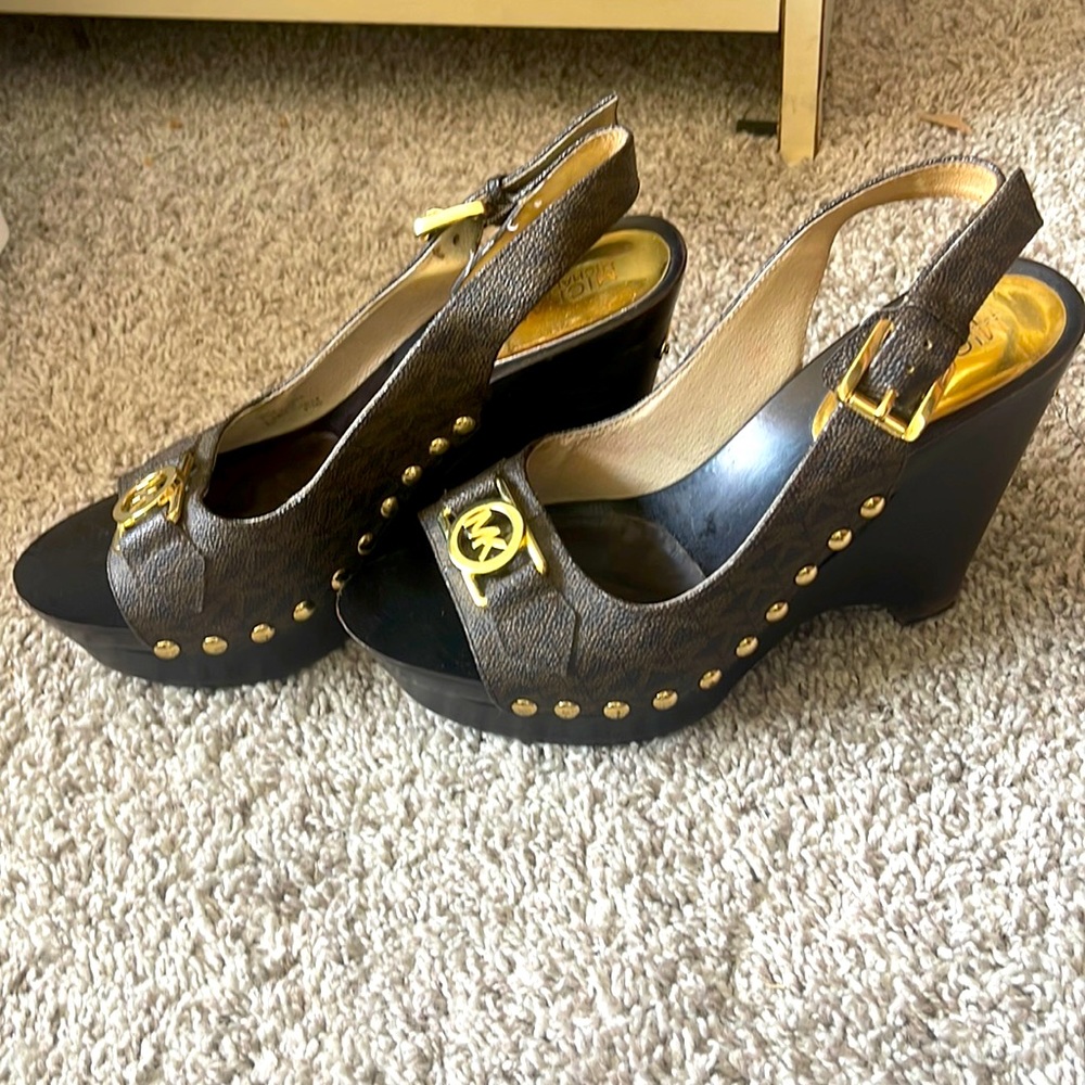 Michael Kors
Brown Mk Charm Sling Wedges.